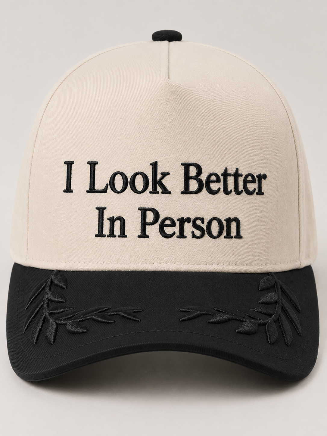 I Look Better In Person Trucker Hat